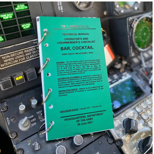 A green cocktail recipe book titled &