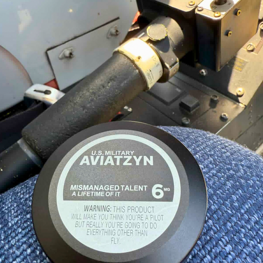 Close-up of a U.S. Military Aviatzyn product with text on a textured surface.