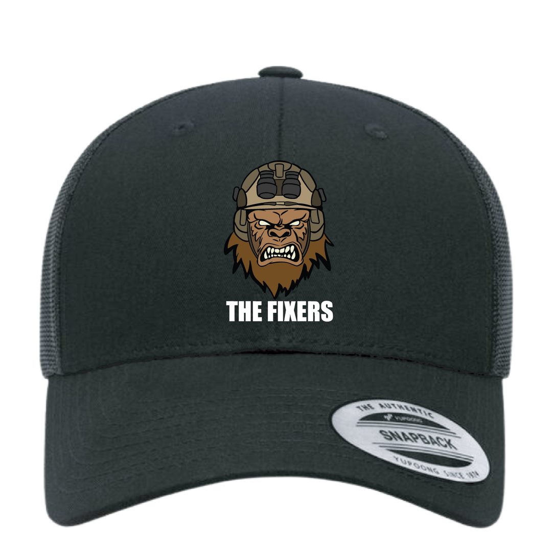 pdmeuasgeneralatomicsthefixersembroidery_Trucker Hat Black.png